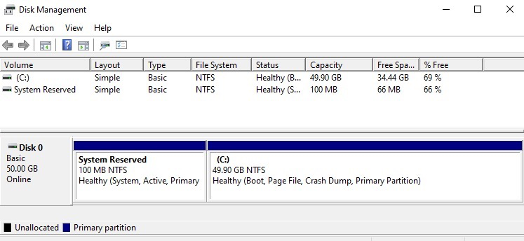 Disk Management showing the reduced disk size