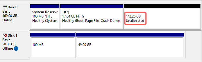 Disk Management showing shrunken C: drive with unallocated space