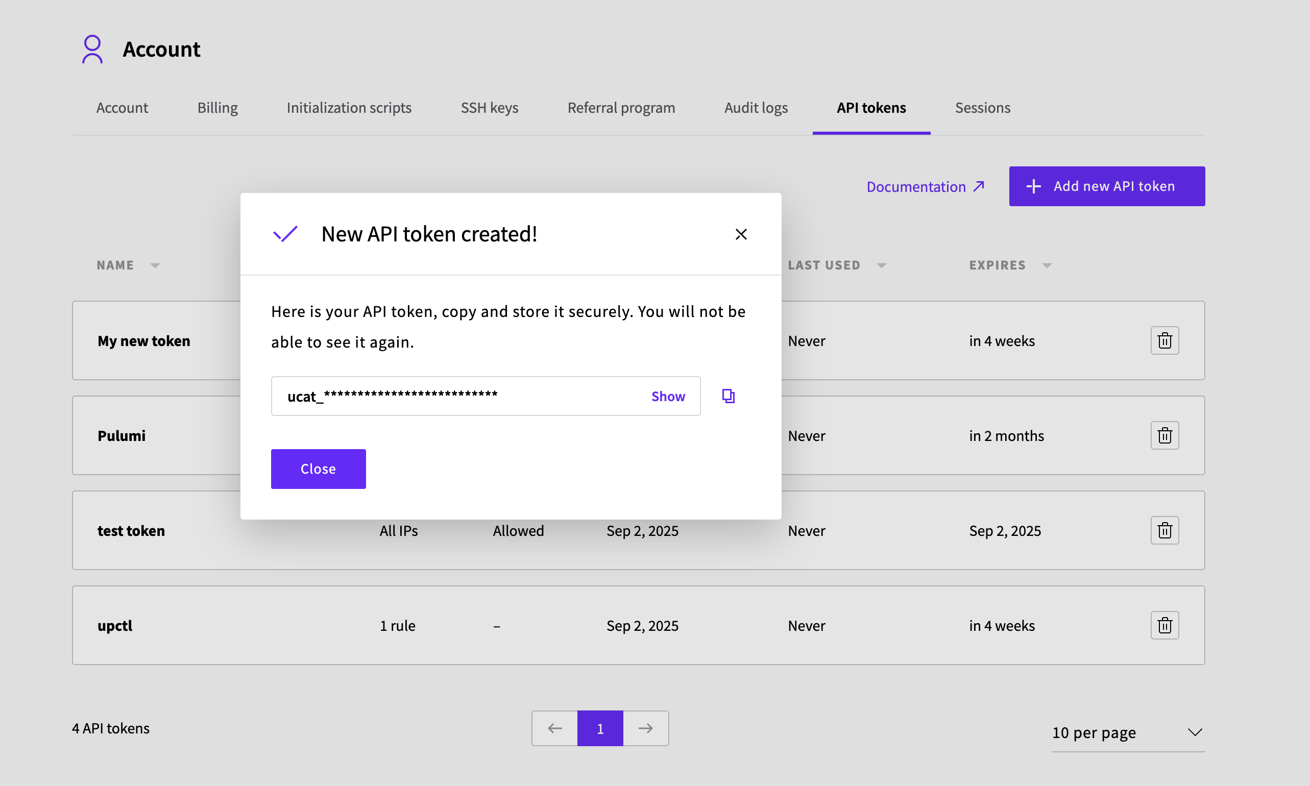 Newly created API token displayed with copy button and security warning