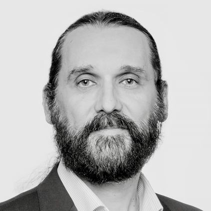 Man in suit with long hair
