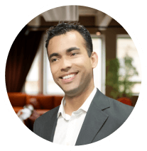 a man in a suit smiling