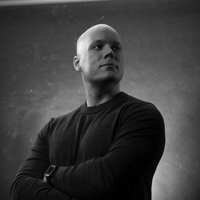 Black and white version of hero shot of UpCloud CPO Teemu Toppola
